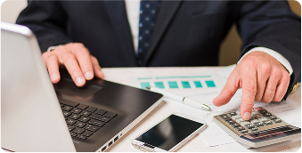 businessman-using-calculator-1